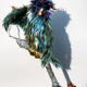 Illustration for article titled What if birds had shattered CDs instead of feathers?